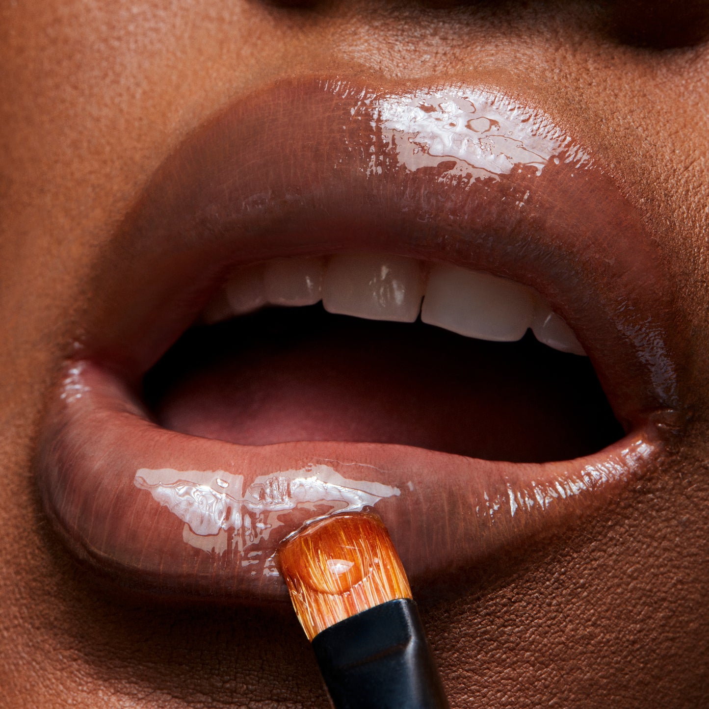 Lipglass Clear with a polished glossy look for Daily Makeup