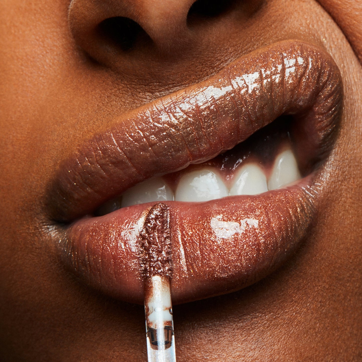 Lipglass with a polished glossy look for Daily Makeup