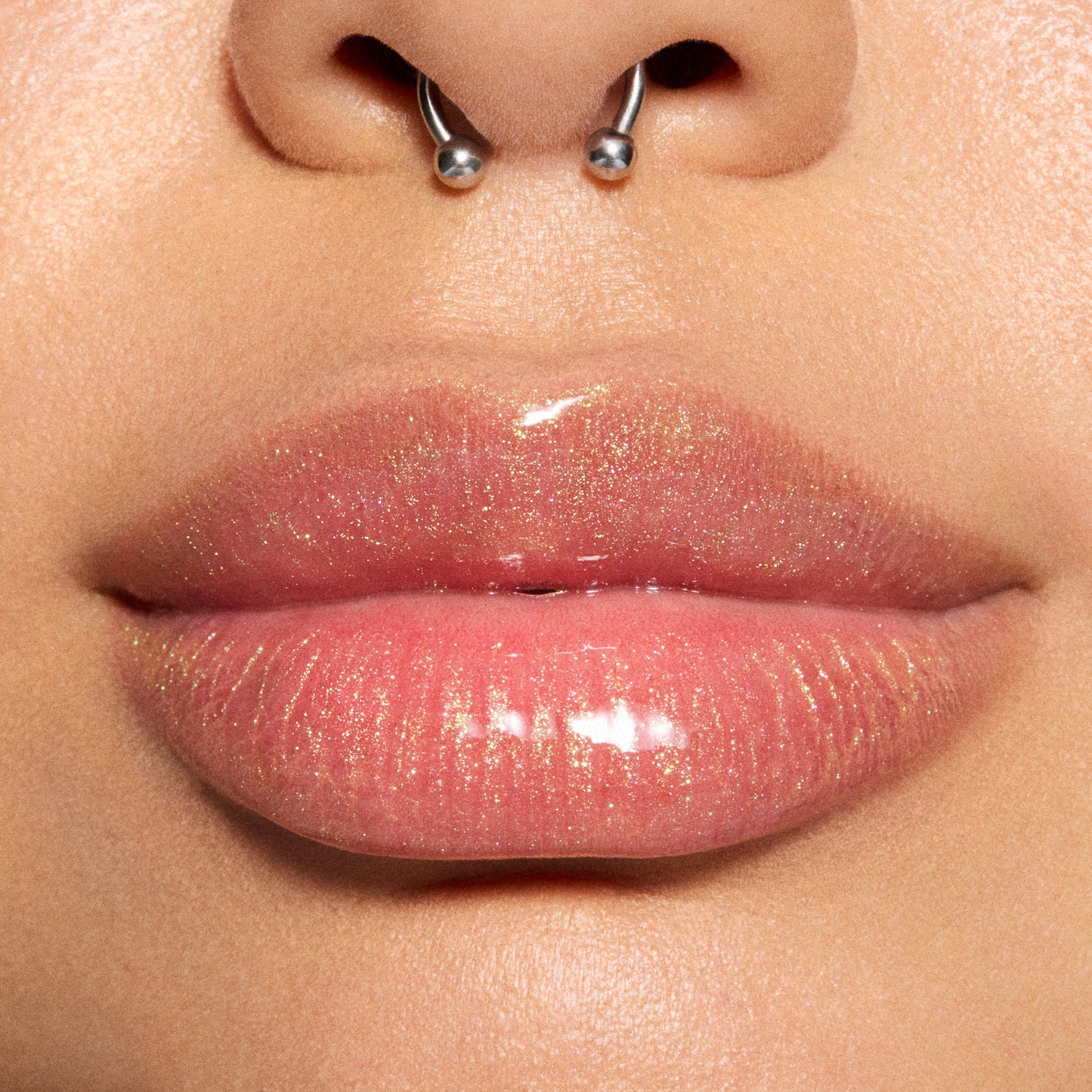 Lipglass Blow Plumping Oil Metamorphosis Collection with a polished glossy look for Daily Makeup